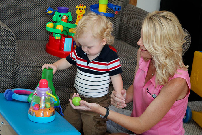 child plays during therapy